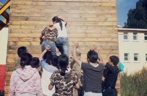 This " graduation wall " a few people has climbe